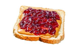 Peanut butter and jelly on white bread toasts. Isolated on white background. Top view. photo