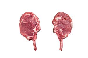 Raw Tomahawk beef veal steak on butcher table. Isolated on white background. photo