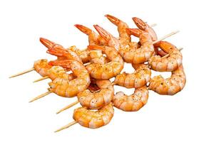 BBQ Roasted shrimps prawns on skewers Isolated on white background, top view. photo