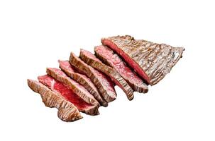 Grilled and cut flank steak. Marble beef meat. Isolated on white background. Top view. photo