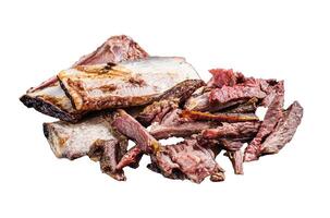 Smoked and grilled beef short ribs in rustic plate with herbs. Isolated on white background. photo