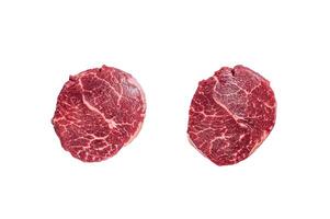 Raw fillet Mignon beef steaks on a butcher board. Isolated on white background. photo