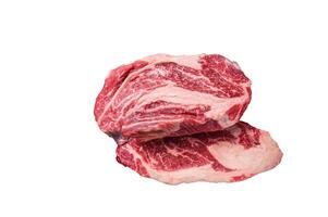 Raw Chuck Roll beef meat steaks on a wooden board with thyme. High quality Isolate, white background. photo