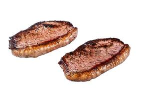 Grilled top sirloin cap or picanha steak. Isolated on white background. photo