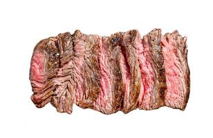 Grilled sliced skirt steak with seasonings and spices. Marbled meat. Isolated on white background. Top view. photo