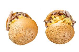 Pulled pork burger with bbq sauce and coleslaw salad. Isolated on white background, top view. photo