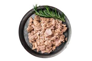 Canned tuna with fresh herbs ready for eat. Isolated on white background. photo