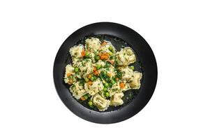 Dumplings Soup with Ravioli pasta in a bowl with greens. High quality Isolate, white background. photo