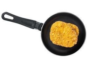 Fried Hash brown potato, hashbrown fritters in a skillet. Isolated, white background. photo