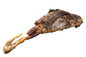 BBQ Roasted lamb mutton leg with herbs and spices on a grill. Isolated on white background. photo