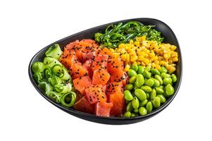Salmon Poke bowl with Cucumber, Edamame, and Rice. Isolated on white background. photo