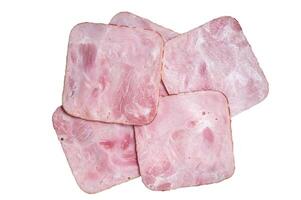Square Slices of pork ham on wooden table. Isolated on white background photo