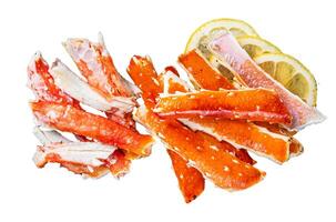 Cooked King Crab legs meat Isolated on white background, top view. photo