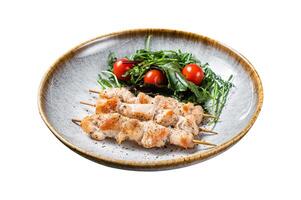 Chicken skewers souvlaki, grilled meat shish kebab skewers. Isolated on white background. Top view. photo