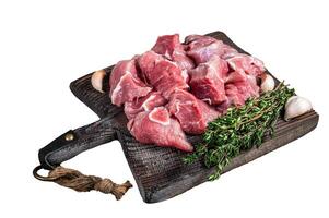 Fresh Raw Diced pork cubs meat with spices Isolated on white background, top view. photo
