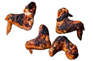 Chicken wings on barbecue, Isolated on white background, top view. photo