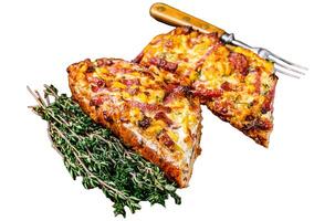 Hot baked sandwich on Baguette bread with ham, bacon, vegetables and cheese on a rustic plate. Isolated on white background. photo