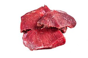 Raw Venison dear meat on butcher cutting board, game meat. Isolated, white background. photo