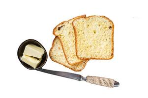 Brioche bread on breakfast table with butter and jam. Isolated, white background. photo
