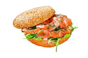 Bagels sandwich with salmon and arugula. Isolated on white background. Top view photo