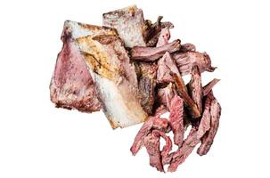 Smoked and grilled beef short ribs in rustic plate with herbs. Isolated on white background. photo