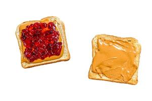 Peanut butter sandwich toast with berry jam. Isolated on white background. photo