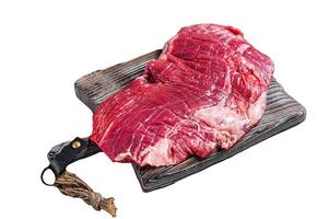 Uncooked Raw Flank or flap beef steak on butcher board. Isolated on white background, top view. photo