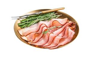 Dry cured pork Black Forest Ham bacon with rosemary. Isolated on white background. Top view. photo