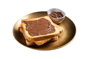 Stack of Toasts with chocolate Hazelnut cream in plate. Isolated on white background. Top view. photo