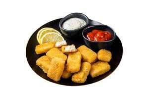 Fried Fish Sticks Fingers with sauce in a plate. Isolated on white background. Top view. photo