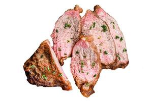 Rare slices of Roast beef sirloin tri tip steak bbq Isolated on white background, Top view. photo
