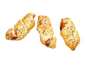 Cutting board with sausage rolls in the dough. Isolated on white background. Top view. photo