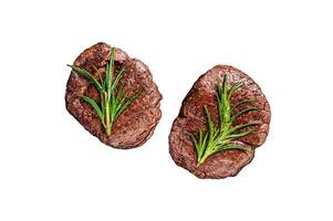 Grilled Fillet Mignon tenderloin meat beef Isolated on white background, top view. photo