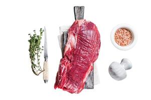 Fresh Flank or flap raw beef steak Isolated on white background, top view. photo