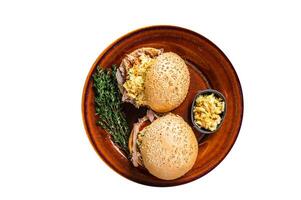 Pulled Pork meat Hamburger with coleslaw salad. High quality Isolate, white background. photo
