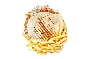 Doner kebab sandwich in grilled pita bread with vegetables and chicken meat. Isolated, white background. photo
