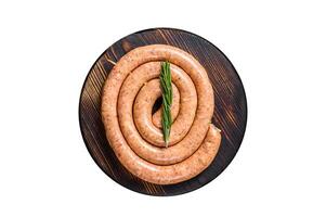 Raw spiral barbecue sausage from pork and beef ground meat. Isolated, white background. photo