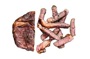 Grilled sliced rib eye or ribeye beef meat steak Isolated on white background, top view. photo
