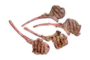 Grilled lamb mutton meat chops steaks. Isolated on white background, top view. photo