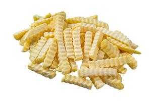 Frozen Crinkle French fries potatoes sticks. Isolated on white background. photo