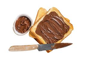 Stack of Toasts with chocolate Hazelnut cream in plate. Isolated, white background. photo