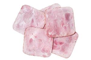 Square Slices of pork ham on wooden table. Isolated, white background. photo