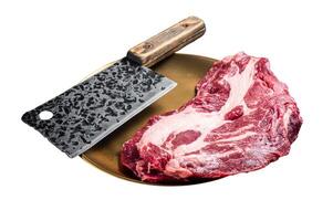 Raw marbled meat Steak on butcher table, uncooked beef chuck eye roll steak. Isolated on white background. Top view. photo