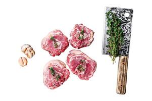 Raw mutton lamb neck meat on a butcher board with cleaver. Isolated on white background, top view. photo