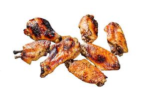 Fried chicken wings with sauce. Isolated on white background. Top view. photo