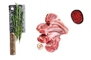 Lamb raw chops steaks on butcher cutting board Isolated on white background, top view. photo