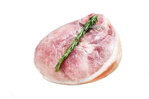 Slice of raw pork knuckle, leg. Farm fresh meat. Isolated on white background. Top view. photo