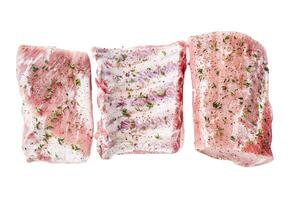 Set of Raw pork cuts, loin meat, spare ribs and brisket. Isolated on white background, top view. photo