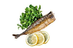 Grilled Mackerel Scomber fish on a plate with greens and lemon. Isolated, white background. photo