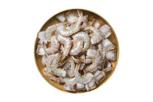 Fresh Raw tiger white shrimp prawn peeled with tail on ice. Isolated on white background. photo